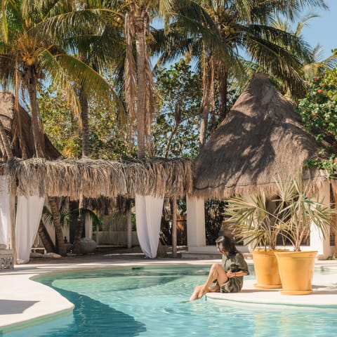 Outdoor pool, open 9 AM to 6 PM, pool umbrellas, sun loungers