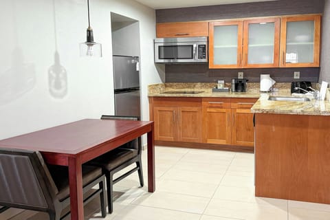 Studio, 1 Queen Bed with Sofa bed | Private kitchen | Fridge, microwave, stovetop, coffee/tea maker