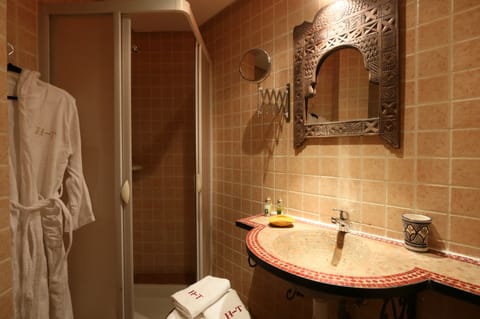 Hair dryer, bathrobes, slippers, towels