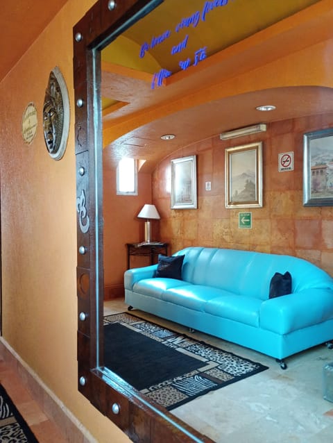 Traditional Double Room | Living area | 32-inch flat-screen TV with cable channels, TV, DVD player