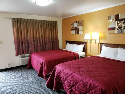 Room, 2 Queen Beds, Non Smoking | Desk, soundproofing, iron/ironing board, rollaway beds