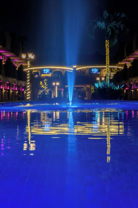 Outdoor pool, open 6:00 AM to 9:30 PM, pool umbrellas, sun loungers