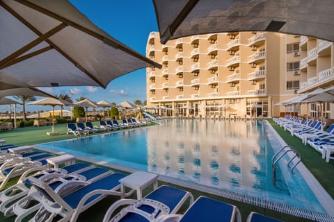 Outdoor pool, pool umbrellas, sun loungers