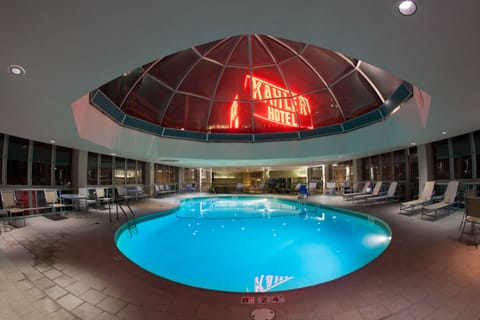 Indoor pool, pool umbrellas, sun loungers