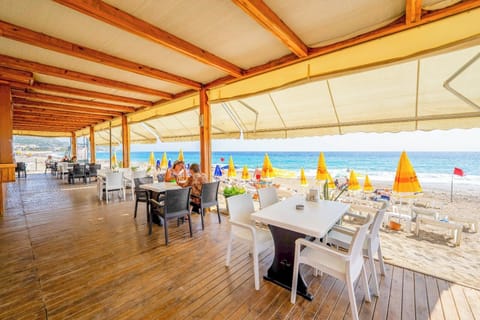 Private beach nearby, sun loungers, beach umbrellas
