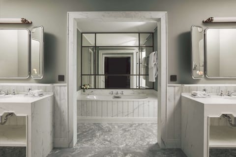 Combined shower/tub, rainfall showerhead, hair dryer, bathrobes