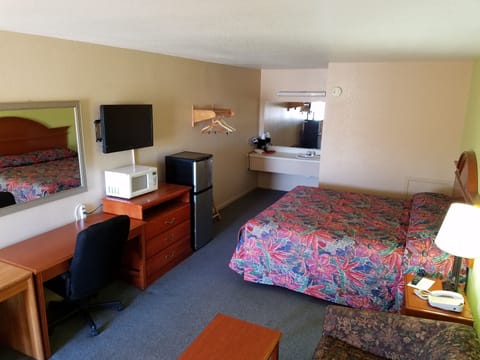 Desk, blackout drapes, iron/ironing board, rollaway beds