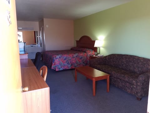 Desk, blackout drapes, iron/ironing board, rollaway beds