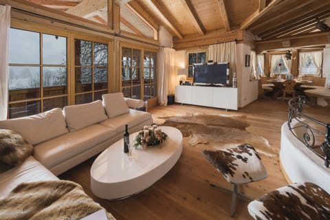 Deluxe Chalet, 5 Bedrooms, Mountain View | Living area | 49-inch flat-screen TV with satellite channels, TV, DVD player