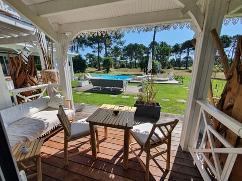 Double Room MIAMI, Golf and Pool View | Minibar, individually furnished, soundproofing, rollaway beds