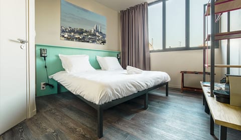 Premium bedding, blackout drapes, iron/ironing board, free WiFi