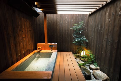 Japanese Style Townhouse | Bathroom | Separate tub and shower, free toiletries, hair dryer, slippers