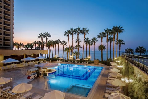 Seasonal outdoor pool, pool umbrellas, sun loungers