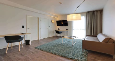 Suite, 1 King Bed, Non Smoking (with Sofabed) | In-room safe, desk, soundproofing, iron/ironing board