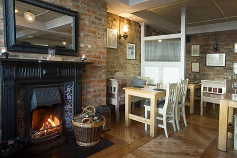 Breakfast, lunch, dinner served; local cuisine 