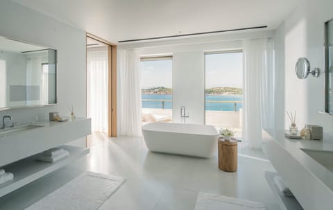 Premium bedding, down comforters, minibar, in-room safe