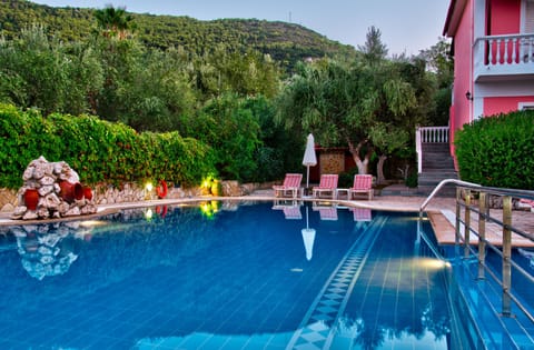 Outdoor pool, pool umbrellas, sun loungers