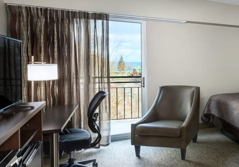 Individually decorated, desk, blackout drapes, iron/ironing board