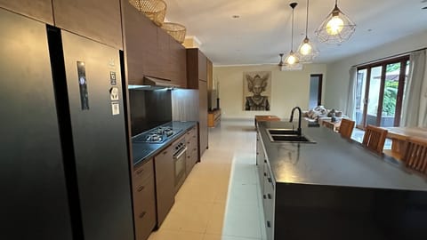 Executive Villa, Pool View | Private kitchen | Full-size fridge, microwave, coffee/tea maker, electric kettle