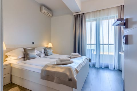 Double Room, Balcony, Sea View | In-room safe, blackout drapes, free WiFi, bed sheets