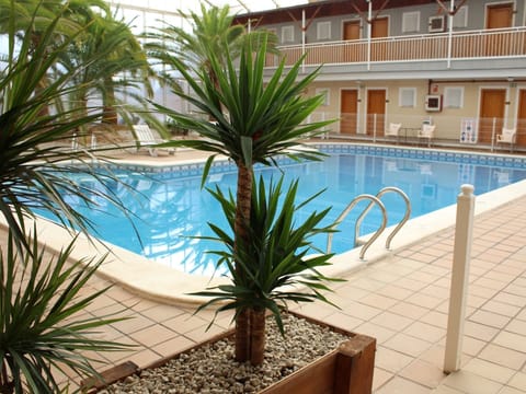 Indoor pool, outdoor pool, pool umbrellas, sun loungers