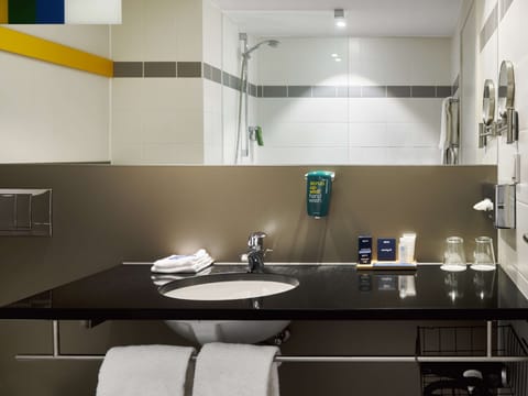 Superior Room | Bathroom | Hair dryer, towels