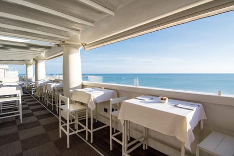 Rooftop bar, alfresco dining, open select days