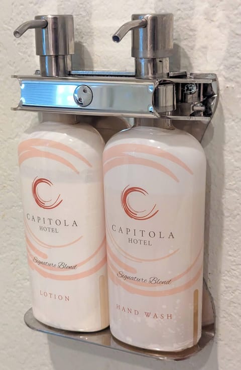 Room (Grand Cayman) | Bathroom | Shower, designer toiletries, hair dryer, slippers