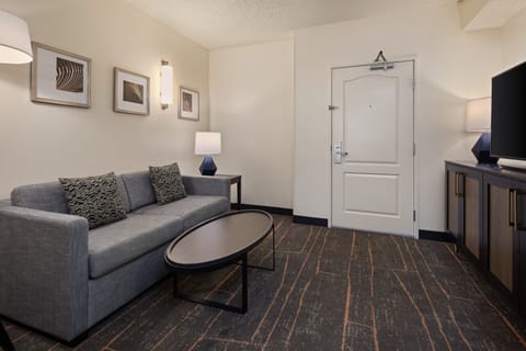 Suite, 2 Queen Beds (Additional Living Area) | Desk, laptop workspace, blackout drapes, iron/ironing board