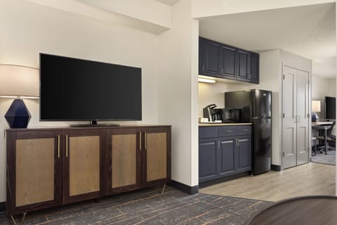 Suite, 2 Queen Beds (Additional Living Area) | Desk, laptop workspace, blackout drapes, iron/ironing board