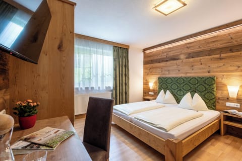 Familyroom (2 adults and 2 children without balcony) | Free WiFi, bed sheets