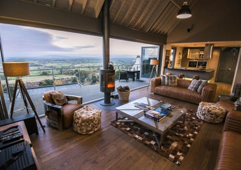 Deluxe House | Living area | Flat-screen TV