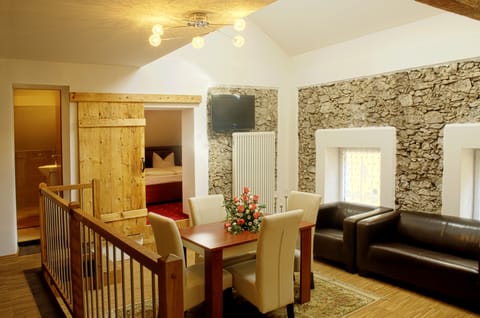 Deluxe Apartment, Annex Building | Living area | Flat-screen TV