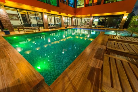 Outdoor pool, pool umbrellas, sun loungers