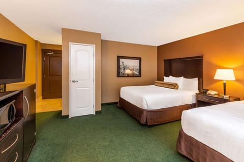 Room, 2 Queen Beds, Non Smoking | Premium bedding, desk, iron/ironing board, free cribs/infant beds