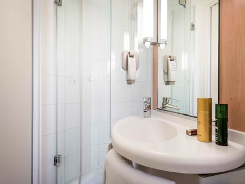 Shower, eco-friendly toiletries, hair dryer, towels