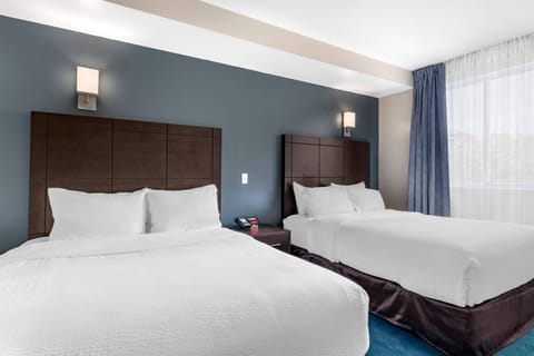 Deluxe Room, 2 Queen Beds, Non Smoking | Premium bedding, down comforters, Select Comfort beds, desk