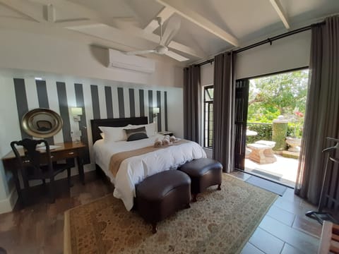 Luxury Suite, 1 Bedroom, Garden View | In-room safe, individually decorated, individually furnished, desk