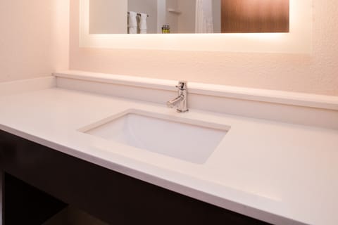 Bathtub, hair dryer, towels