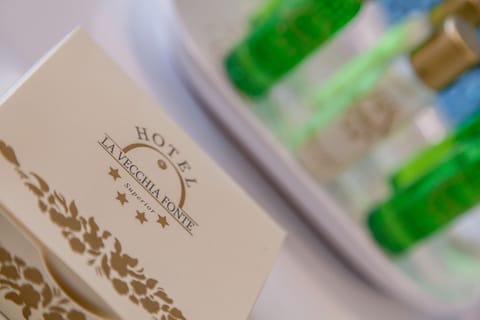 Designer toiletries, hair dryer, bidet, towels