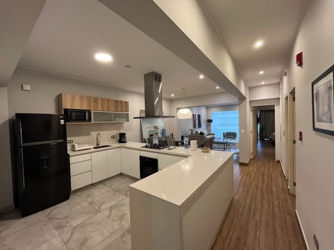 Exclusive Apartment, 3 Bedrooms (601) | Private kitchen | Full-size fridge, microwave, cookware/dishes/utensils