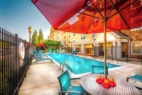 Outdoor pool, open noon to 9:00 PM, pool umbrellas, sun loungers