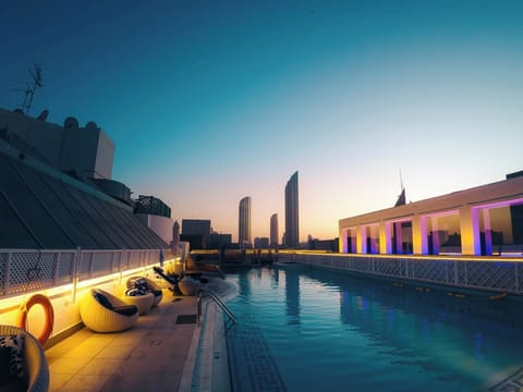 Outdoor pool, pool umbrellas, sun loungers