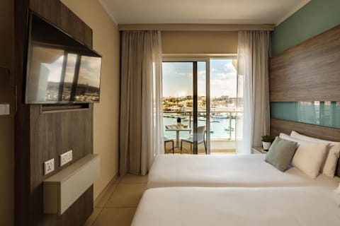 Standard Double or Twin Room, Sea View | Minibar, in-room safe, desk, laptop workspace