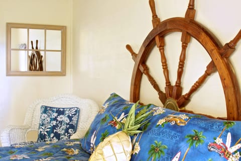 Room, Private Bathroom (TropiCaboose) | 1 bedroom, hypo-allergenic bedding, individually decorated