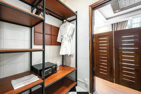 Family Room | Minibar, in-room safe, blackout drapes, iron/ironing board (on request)