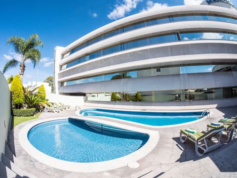 Outdoor pool, sun loungers