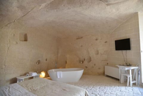 Suite | Premium bedding, down comforters, memory foam beds, minibar