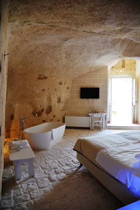 Suite | Premium bedding, down comforters, memory foam beds, minibar