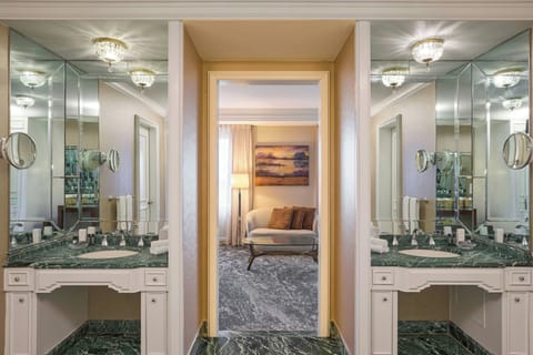 Designer toiletries, hair dryer, bathrobes, towels